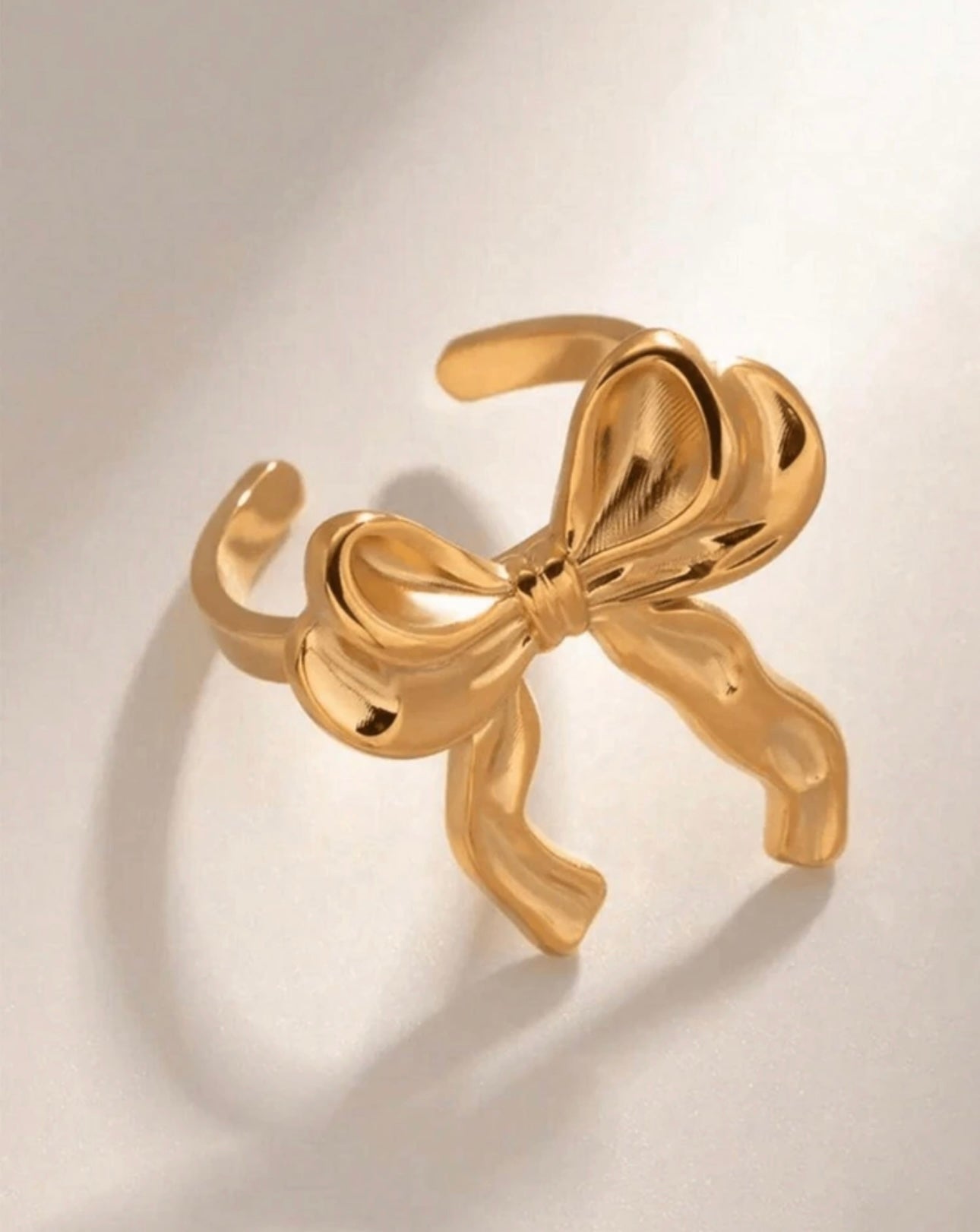 Golden bow adjustable ring